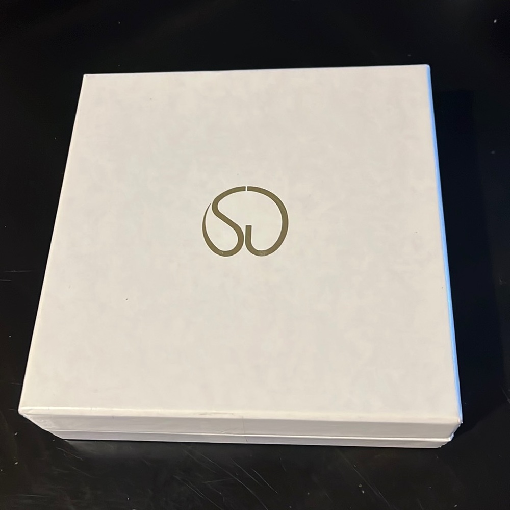 Authentic, vintage St. John square box.